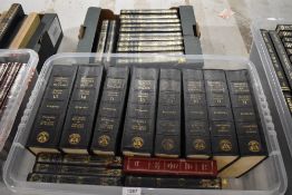 A carton of mixed books including Law, Finance interest and various Alistar Maclean volumes.