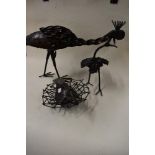 Three modern metal bird sculptures possibly for the garden.