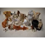 A collection of animal themed figure studies including a Wedgwood deer, Sylvac spaniel and puppies