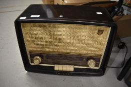 An early 20th century Phillips MK40043 radio set in bakelite case.