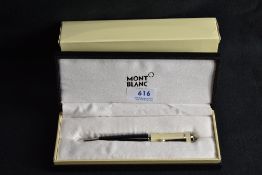 A Montblanc Greta Garbo ballpoint pen. This special edition pen with black barrel and cream cap