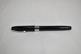 A Sheaffer 300 converter fountain pen in black with steel trim. In very good condition