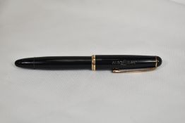 A Montblanc 3-42G piston fill fountain pen circa 1952 in black with single band to cap having