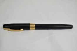 A Sheaffer Imperial Touchdown piston fill fountain pen in black with broad band to base of cap