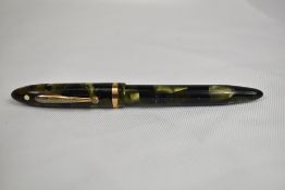 A Sheaffer Junior Balance Lifetime lever fill fountain pen in marine green with single broad band to