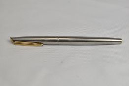 A Waterman CF converter fountain pen in brushed steel having 14ct nib. In very good condition