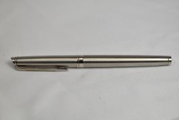 A Waterman Hemisphere Converter fill fountain pen in stainless steel having Waterman nib. In Very