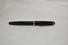 A Montblanc 3-42 piston fill fountain pen circa 1952 in black with single band to cap having