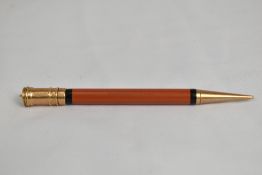 A Parker Duofold propelling pencil in coral red with ringtop. In good condition