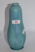A Royal Lancastian vase of gourde form, having mottled blue glaze.