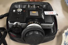 A Minolta 110 zoom SLR camera with Rokkor Macro 1:4,5 F25-50 lens