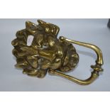 A large Victorian cast brass lion mask door knocker.