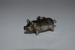A novelty Thornhill retractable pencil in the form of a pig, circa 1880s.