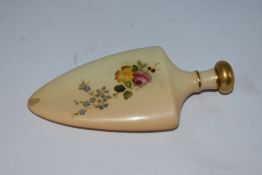 A Royal Worcester blush ivory perfume bottle of spade form, having floral decoration of roses and