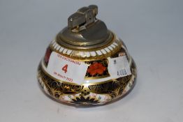 A Royal Crown Derby desk top lighter, in the Imari Palette, 1128 to underside.