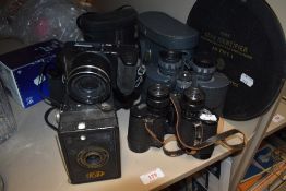 A selection of vintage cameras, binoculars and a star identifier 'A-N type 1, Hydrographic office'
