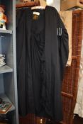 Two vintage university gowns, including 1930s robe labelled for Northam robe makers, by