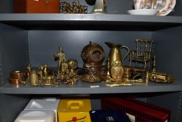 A large collection of vintage brass collectables, including miniature rocking chair, replica