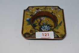 An intricate cloisonne enamel ash tray, circa 1930s, having floral depiction on imperial yellow