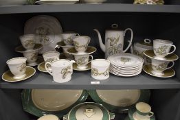 A Susie Cooper for Wedgwood partial tea/coffee service, comprising plates, cups and saucers,coffee