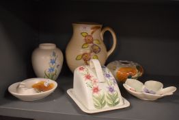 A selection of Radford and Arthur wood pottery, all having floral designs, jug, vase, rose bowl