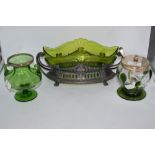 A trio of green glass ware, comprising white metal Bon Bon dress having scroll handles, a vase