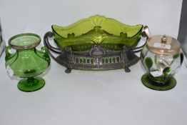 A trio of green glass ware, comprising white metal Bon Bon dress having scroll handles, a vase