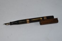 A Waterman Ideal 52 lever fill fountain pen in BHR with two gold bands to barrel, damage to cap