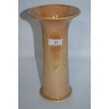 A 1923 dated Ruskin vase of fluted tubular shape, having peach lustre glaze.