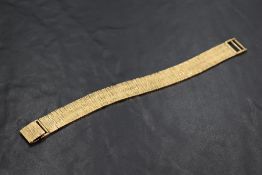 A 9ct gold textured link bracelet, marked 375 to clasp, 18cm long, 35grams