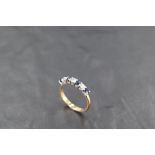 A seven stone sapphire and diamond half eternity ring, total approx 0.45ct on an 18ct gold loop,