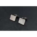 A pair of Georg Jensen silver cufflinks model: 113, having checker board patterned panels