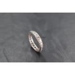 A diamond and platinum full eternity ring having 21 diamonds, total approx 1ct in a pave mount