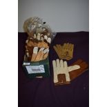 Around thirty pairs of vintage gents leather driving gloves, unworn, most with original tags.
