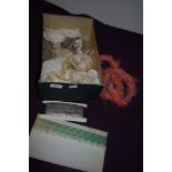 A box of antique lace and trimmings, including embroidered edging, metallic thread, beaded