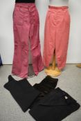 A pair of 1970s dead stock bell bottoms and a pair of high waisted 1950s/60s pedal pushers, both