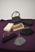 Six handbags, around 1940s to 1950s, including extensively beaded bronze tone clasp top bag in box