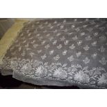 A large piece of antique lawn cotton with fine embroidery and lace work floral sprigs.