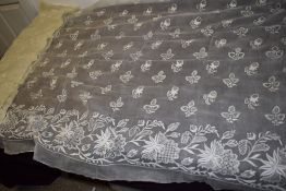 A large piece of antique lawn cotton with fine embroidery and lace work floral sprigs.