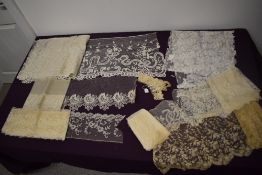 A collection of large pieces of antique lace.