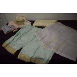A selection of vintage and antique clothing, to include bloomers, handkerchiefs, aprons,