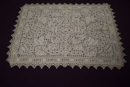 A section of late 16th century cut linen with plaited lace edge.