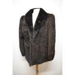 A 1970s dark brown/ black mink coat having chevron pattern interspersed with suede, Vintage size