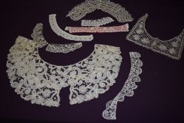 A collection of antique lace and similar collars, varying eras with various methods used, some