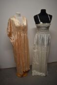 A 1950s white nightdress with shirred bodice and a 1930s/40s pink nightdress, for repair,