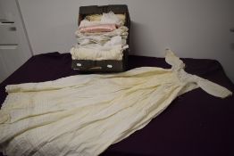 A selection of babies and children's clothing, dresses, gowns and shawls etc, some beautiful