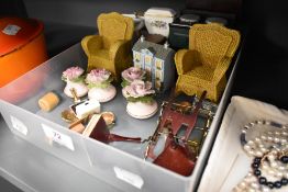 A selection of miniature dolls house furniture including an AGA.