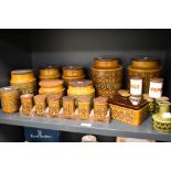 A great collection of mid century Hornsea Pottery Bronte pattern kitchen storage jars, also with a