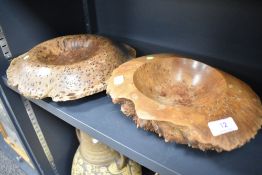 A modern Wandue Burr wood hand turned bowl and a similar bowl, largest measuring 30cm across.
