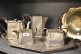 A 1930's Craftsman Sheffield Pewter part tea set with tray, milk, teapot and water jug.